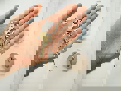 person holding keys to house