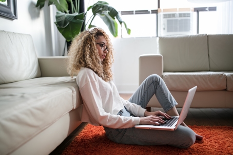 young woman working on laptop